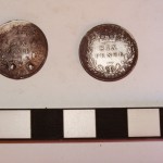 Back side of two sixpence’s excavated at the mess hall at Sabi Bridge
